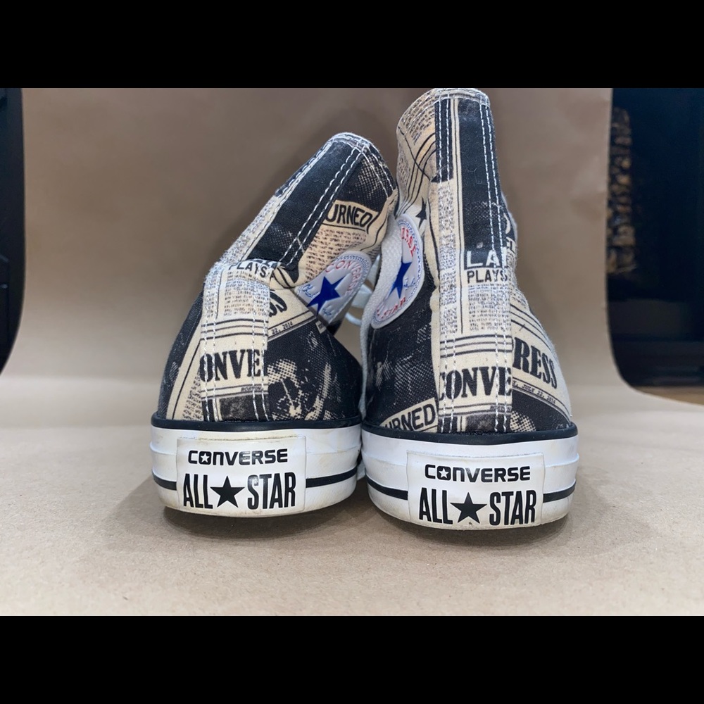 Converse, newspaper style. Size 10 women’s, 8 men’s.